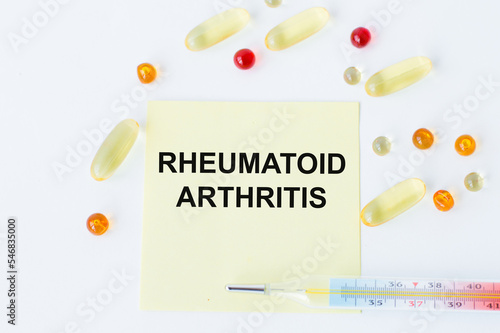 a card with the name of the diagnosis - rheumatoid arthritis. Medical concept.