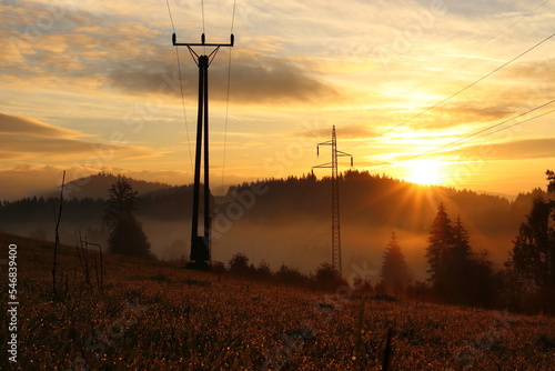 power lines in sunrise