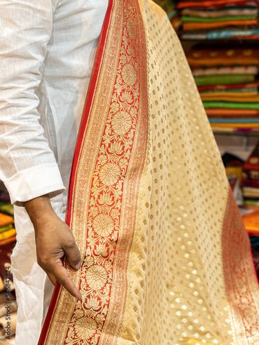 Banarasi saree with beautiful texture and hand work on it.