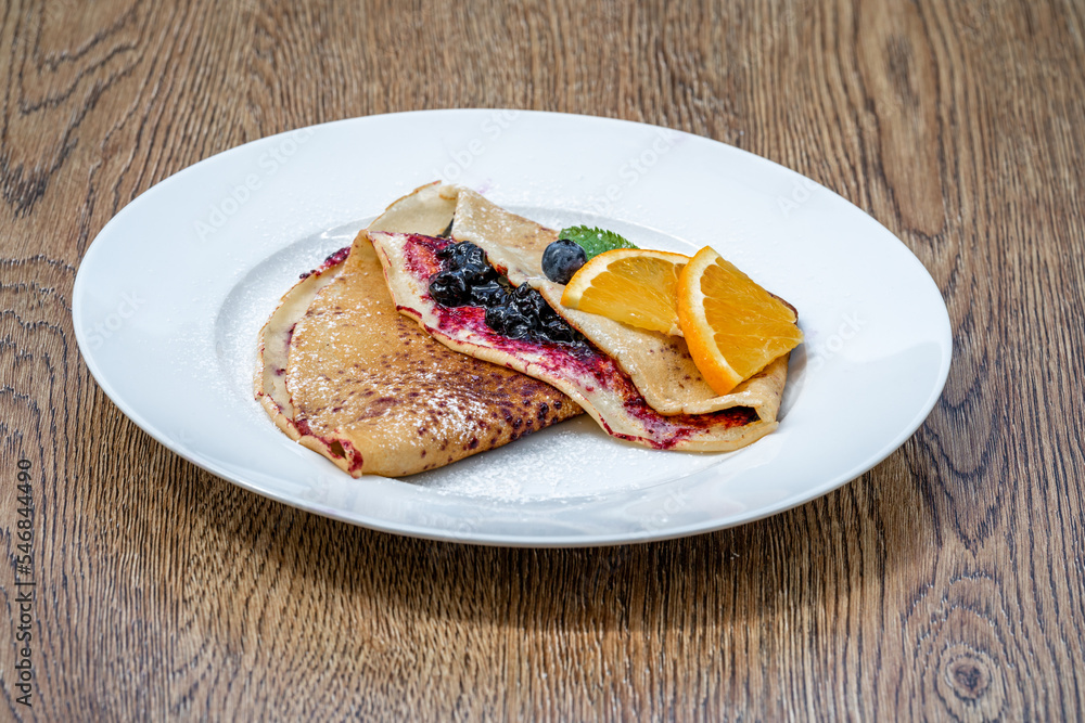 pancake with fruit and marmalade for breakfast and as dessert