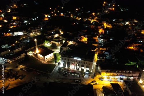 Berat is a city on the Osum River, known for its white Ottoman houses and castle on the hill, aerial night view of this historical city,Albania,Europe