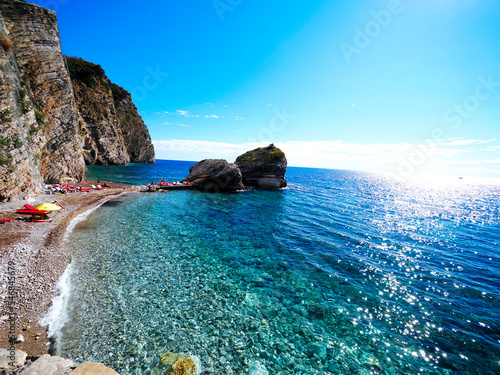 Piękne wybrzeże Czarnogóry w okolicach Budva Riviera- widok z morza   na plaże i miasteczka to niezapomniane przeżycie  photo