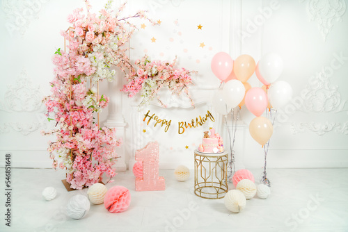 Birthday decoration in pink colors for baby girl 
