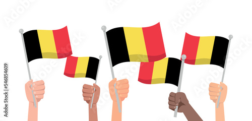 Hands with belgium flag isolated on white background. People hold belgium flag.Vector stock © Jessica