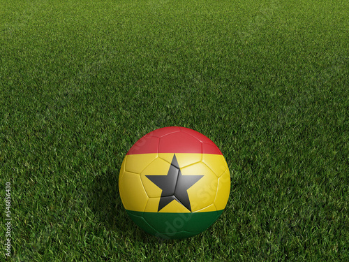Football in  Ghana flag  on  green grass. 3d rendering