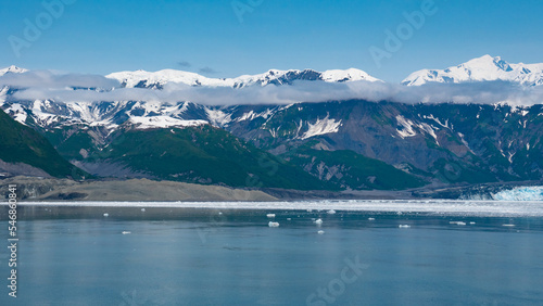 Mountain glacier under blue sky nature scenery. Hubbard Glacier nature in Alaska, USA