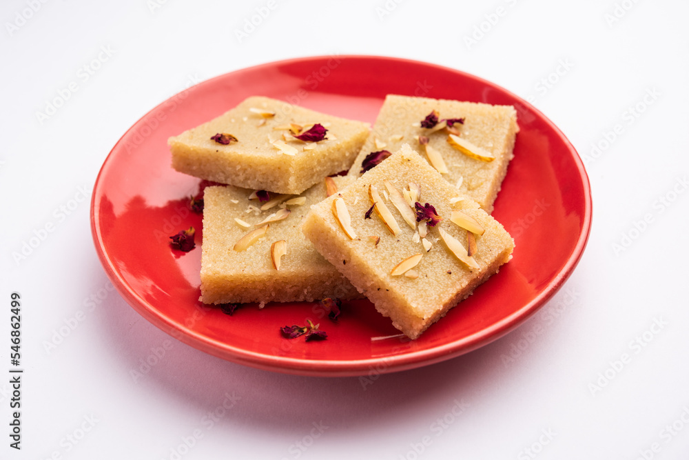 Rava barfi or sooji burfi or barfee is an Indian Sweet made with semolina, sugar, ghee and almonds Rava barfi or sooji burfi or barfee is an Indian Sweet made with semolina, sugar, ghee and almonds