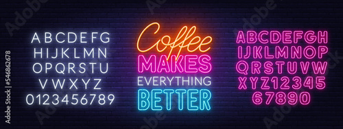 Coffee Makes Everything Better neon quote on brick wall background.
