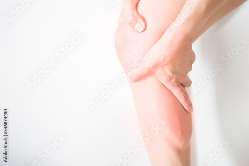 Pain in the muscles of the foot and knee joint, the human body, on a white background