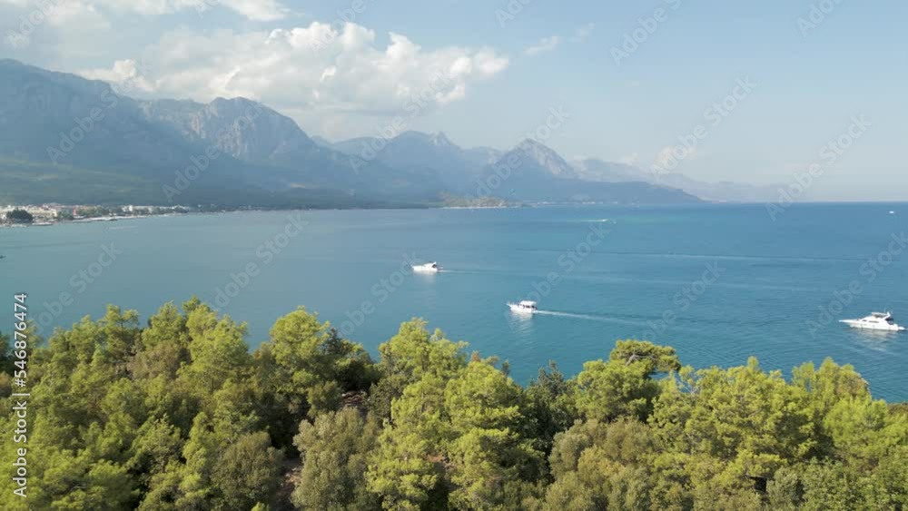 Aerial view of boats sailing along the coast, Kemer, Turkey. Aerial view of boats sailing along the coast, Kemer, Turkey.