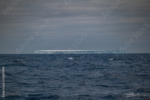 Huge tabular iceberg in the sea