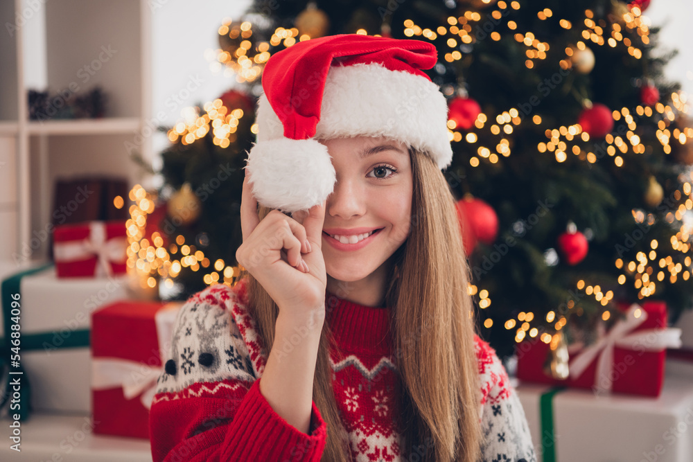 Photo of pretty positive lady showing white fur pompon hiding eyes enjoy xmas morning cozy room miracle time house indoors Photo of pretty positive lady showing white fur pompon hiding eyes enjoy xmas morning cozy room miracle time house indoors