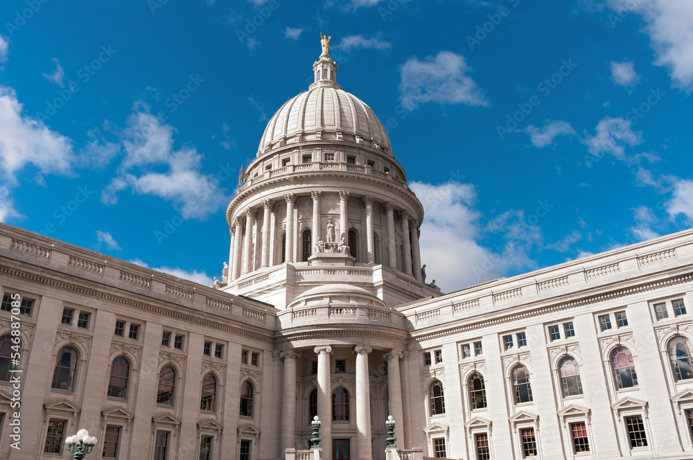 beaux arts style architecture of wisconsin state capitol and dome under blue skies