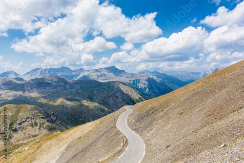 Scenic view of road on top of the french Alps in Mercantour National Park against dramatic sky