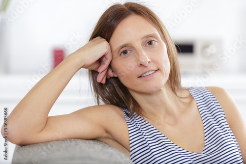 woman relaxing in sofa at home