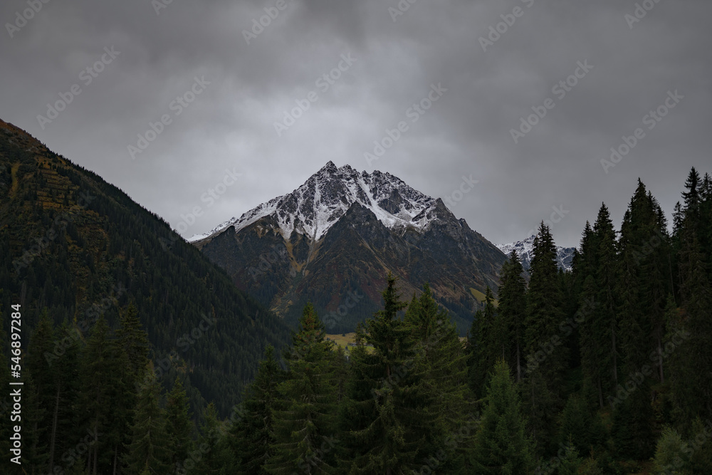 Snow capped mountain in autumn landscape