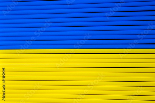 yellow and blue plastic straws . top view