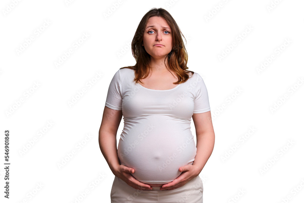 Sad negativity on face of pregnant woman, studio shot on white background Sad negativity on face of pregnant woman, studio shot on white background