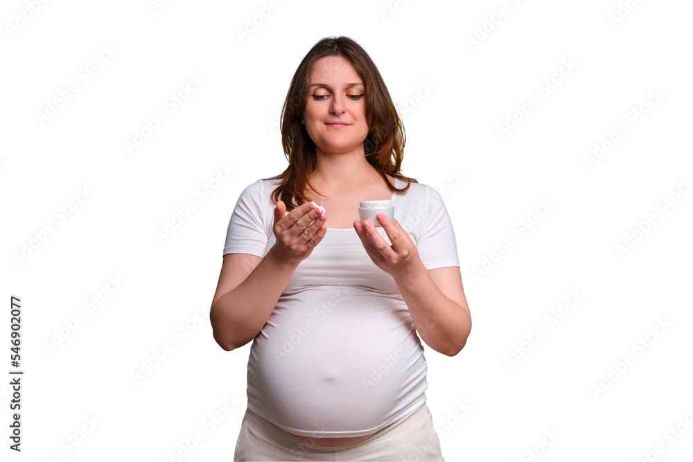 Portrait of a pregnant woman with cream on her hands, white background Portrait of a pregnant woman with cream on her hands, white background