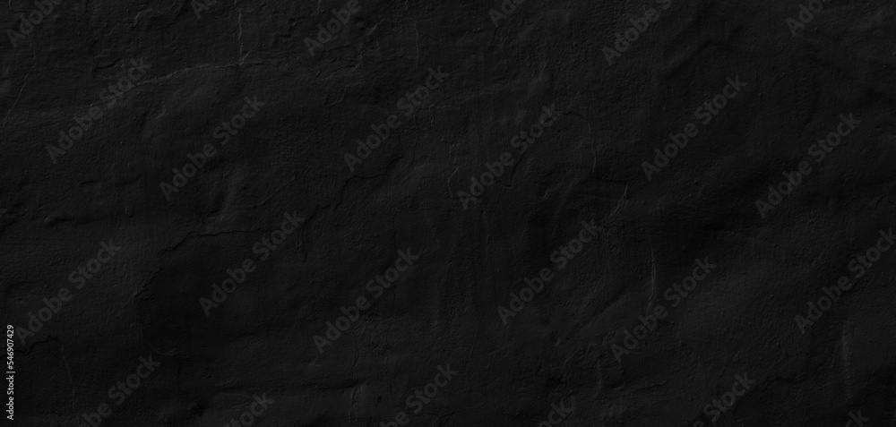 Naklejka premium black and dark concrete wall painted with traces of brushes and reliefs. Artistic background texture for photography shot, product display, print creative or website banner.