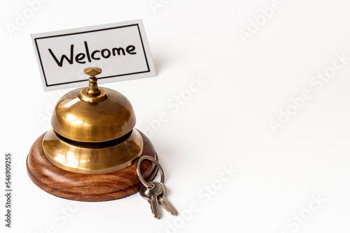 Hotel service bell with keys. Booking and checkin concept