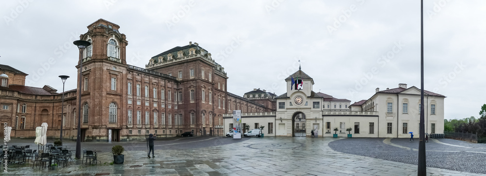 Extra wide angle view of The beautiful facades of the Royal Palace of the Savoy in the Venaria Reale