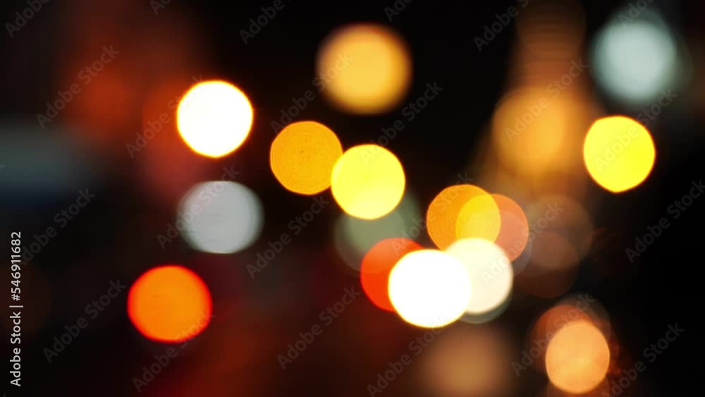 Bokeh of city street lights decorated with beautiful lights. In the festival of happiness and celebration.bokeh background.4k. Bokeh of city street lights decorated with beautiful lights. In the festival of happiness and celebration.bokeh background.4k.