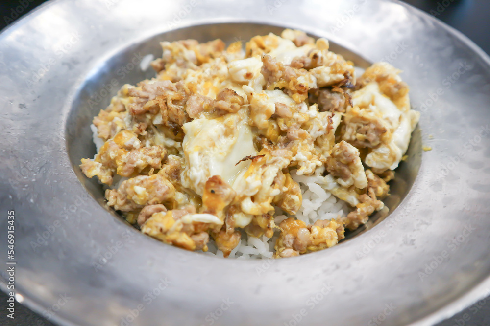 omelette, omelet or fried egg and rice or rice topped with stir fried egg omelette, omelet or fried egg and rice or rice topped with stir fried egg