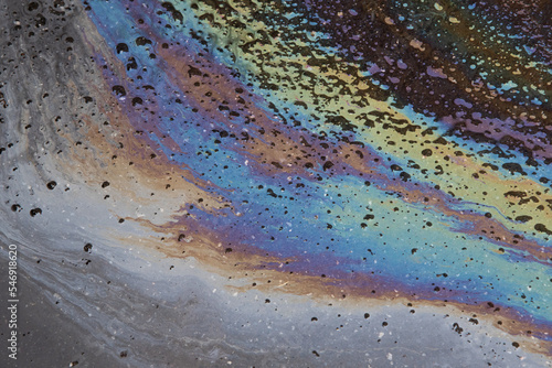 Canvas-taulu Oil slick on the asphalt road background