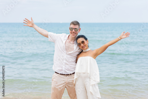 happy couple on the beach © kongga studio