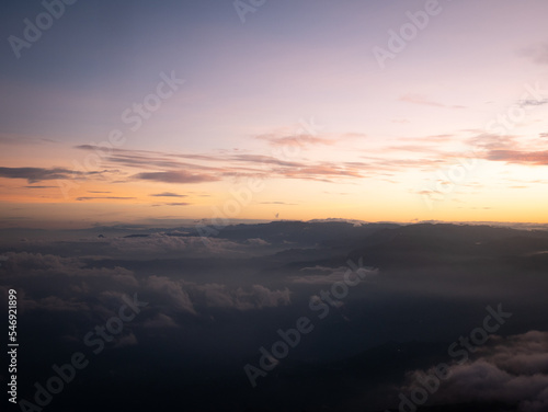 Sunrise in the Mountains of Antioquia  Colombia with a Yellow Sky and Full of Clouds