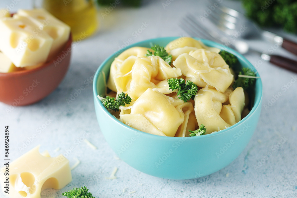 A bowl with Italian dumplings - tortellini A bowl with Italian dumplings - tortellini