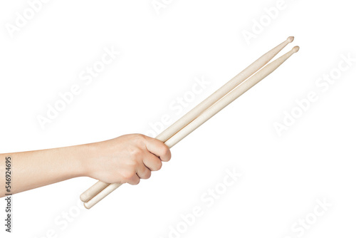 Wooden drumsticks in hand. Drum sticks isolated on white background. Holding drumsticks.