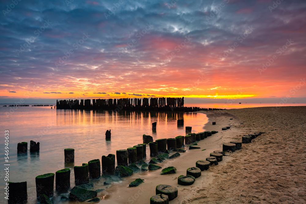 Obraz premium Sunrise over the beach at Baltic Sea in Babie Doly, Gdynia. Poland