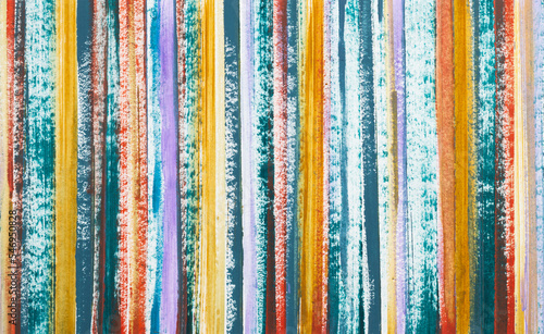Multi-colored stripes painted with acrylic paint. Geometric background.