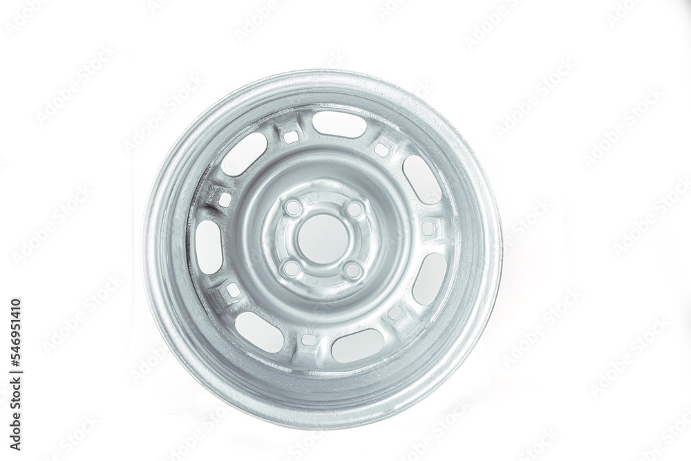 on a white background. a metal disc of a car without a tire. close-up. on a white background. a metal disc of a car without a tire. close-up.