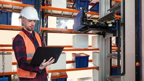 Warehouse inspector with la...