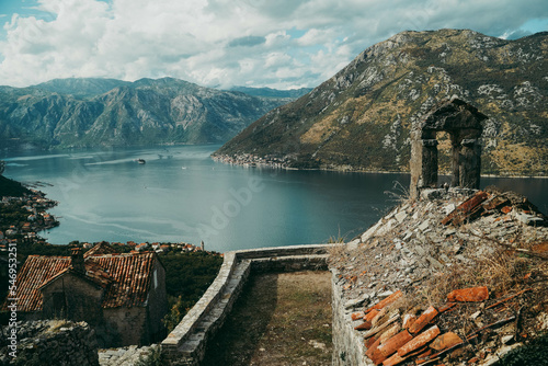 Fototapeta Naklejka Na Ścianę i Meble -  Picturesque view of the Bay of Kotor, mountains and the old church.