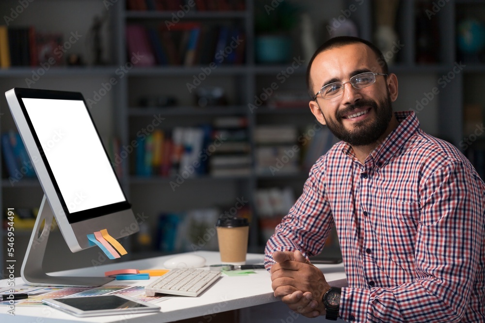 Bearded businessman working on laptop in office. Video online webinar. Bearded businessman working on laptop in office. Video online webinar.