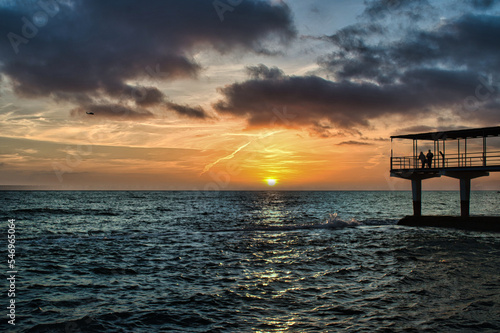 sunset on the beach © pilotrs