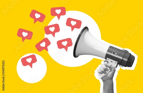 Hand with megaphone and likes icons, social media photo