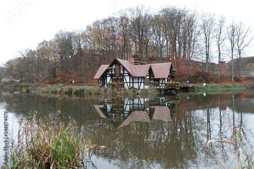 Houses on the water in Charlotta Valley near Ustka, Poland. Charlotta Valley is known for its Rock Legend Festival, performed here Santana, Plant, ZZ-Top
