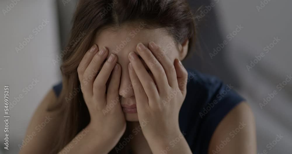 Sad young woman covered her face with her hands Sad young woman covered her face with her hands