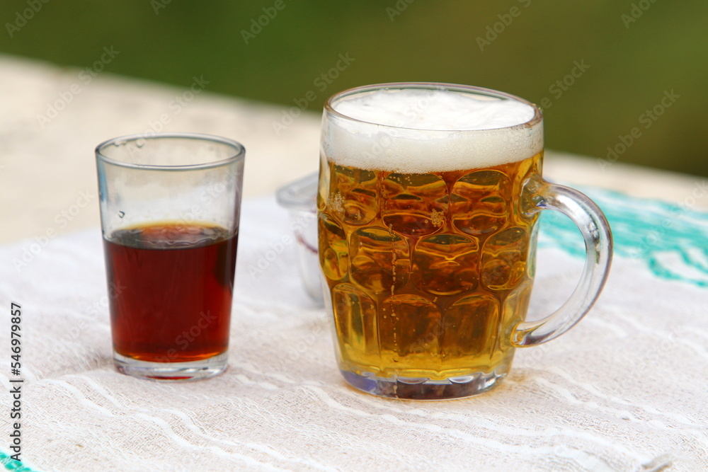In a glass of fresh and cold beer. In a glass of fresh and cold beer.