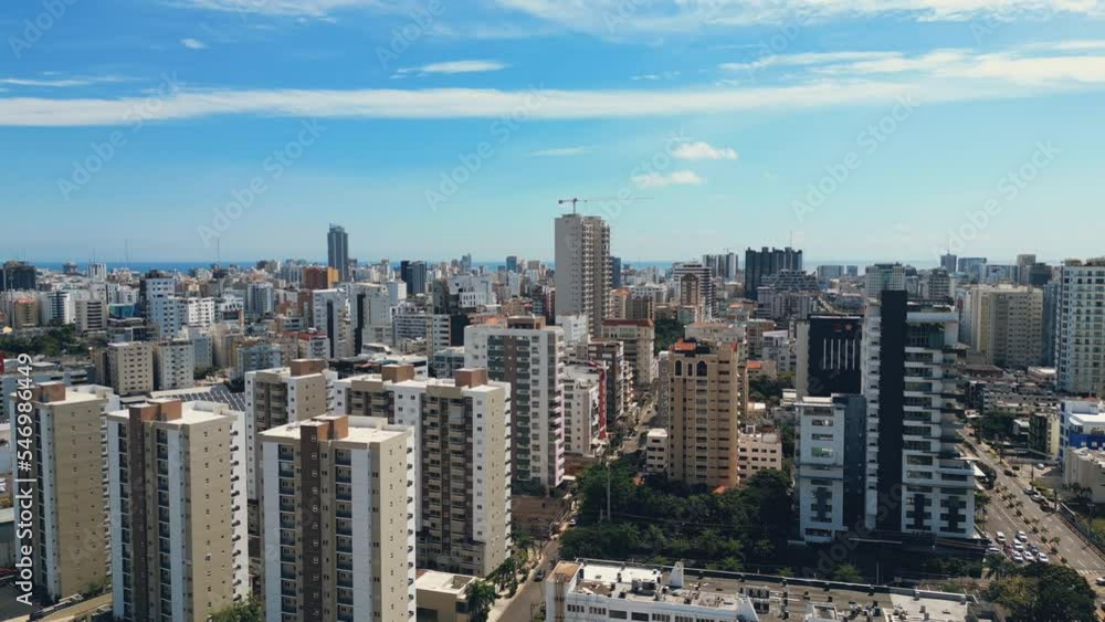 Aerial view of cityscape of Santo Domingo, Dominican Republic, pedestal movement. City downtown in soft evening light. Aerial view of cityscape of Santo Domingo, Dominican Republic, pedestal movement. City downtown in soft evening light.