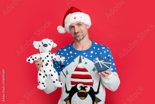 merry xmas and happy new year. smiling man hold xmas present. man with new year present © be free