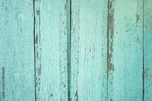 Old vintage wooden background of mint color. Colorful striped wood lumber wall.