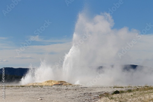 water geyser erupting in cascades