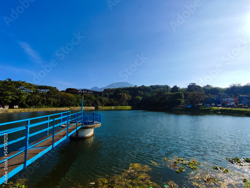 Fototapeta Naklejka Na Ścianę i Meble -  Beautiful landscape view of lake and mountain with clear blue sky in the morning