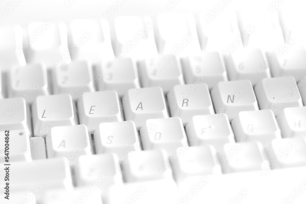 White keyboard with the letters rearrange to spell the word White keyboard with the letters rearrange to spell the word
